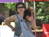 Palomar's Student Amy Ray carries her 9-month old service dog Sophia due to hot California day on April 20. Johnny Jones /The Telescope