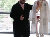 Jason Garrido, a tutor for the STEM Lab, poses with the lab skeleton on April 13. Christopher Jones/The Telescope