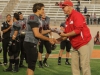 November 22, 2014 |Palomar Punter #60 Codey Wuthrich accepts the Palomarsâ Player of the Game award from Palomar Athletic Director Scott Cathcart. Wuthrich punted eith times for an average of 42 yards, the longest being 54yards. The Comets went on to defeat the Vaqueros 30-22 and win the Patriotic Bowl at Escondido HS, in Escondido California.| Photo Credit: Philip Farry | The Telescope