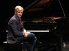 Ed Kornhauser sits at his piano during concert hour at the Howard Brubeck Theatre April 7. Christopher Jones/The Telescope