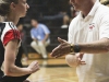 October 2,2013 | Coach Karl Seiler (right) pulls Katy Harlow (left) to the side to go over the game at Palomar College Dome. Guillermo Escamilla/ Telescope