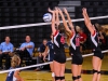 #4 Rylee Zimmerman , #10 Kelli Iverson, and #5 Rachel McFarland Jump to block the shot Sept. 10, 2014. •Philip Farry / The Telescope