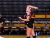 #4 Rylee Zimmerman attempts a jump serve during the first set Sept. 10, 2014. •Philip Farry / The Telescope