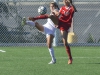 Palomar defender Justine Miranda beats Alexis Elias to the ball in their game against Victor Valley College on Oct. 3 at Minkoff Field. •Casey Cousins/ The Telescope