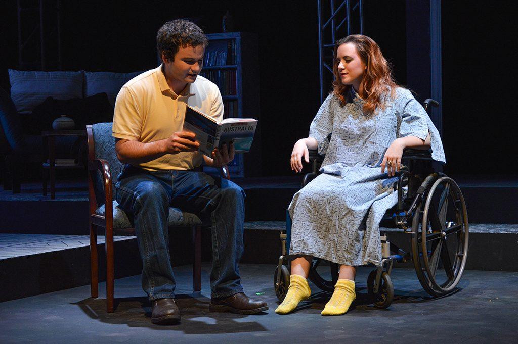 Sara (Savannah Fairchild-Lowe) is visited and comforted in physical therapy by her ex boyfriend Peter (Nick Stout). Dress Rehearsal Jan. 29, 2015. (Jacob Banks/The Telescope)