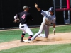 Palomar's Dylan Breault (4) defends third base against San Diego Mesa College runner on March 22 at Palomar Ballpark. The Comets had strong hitting in the 4th and 5th innings and went on to defeat San Diego Mesa 16 – 11. Johnny Jones/The Telescope