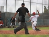 Palomar third baseman Aaron Blackwell slides home safely on Dillan Smith’s RBI double against San Diego City College on March 25 at Myer’s Field. The Comets beat the Knights 6-1 to improve their conference record to 11-2. • Scott Colson/The Telescope