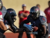 November 22, 2014 | Palomar quarterback #2 Mitch Bartram hands the ball off to running back #5 Justin Harris during the second quarter. The Comets went on to defeat the Vaqueros 30-22 and win the Patriotic Bowl at Escondido HS, in Escondido California. Photo: Philip Farry | The Telescope