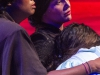 Hortensia, played by Monique Barbor (left), Ramona, played by Camilla Aguilar (center), and Esperanza, played by Maya Zamora (lower right), huddle together and watch their home burn to the ground, during the dress rehearsal of Esperanza Rising, Thursday April 24, 2014 in the Studio Theatre. Lucas Spenser/Telescope.