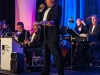 Russ Stolnack a.k.a Russ T. Nailz, MC of the Nov. 16 fundraising event sings his introduction in the Costa Del Sol of the La Costa Resort. • Lucas Spenser/Telescope