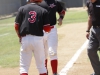 Palomar’s Chris Stratton (3) waits for Francis Christy to touch home plate as the home plate umpire looks on. Christy hit a two run home run in the third inning against visiting Irvine Valley College May 10 at Myers Field. The Comets won the game 11-1 and swept the Lasers 2-0 in the Super Regional. Philip Farry / The Telescope