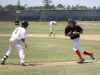 Palomar’s Jake Barnett fields a bunt and tags out Irvine Valley’s Clint Jack during the third inning against visiting Irvine Valley College May 10 at Myers Field. The Comets won the game 11-1 and swept the Lasers 2-0 in the Super Regional. Philip Farry / The Telescope