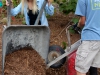 Madison Power and Chris Schrenk, STEM Ambassadors, transport mulch at the Spring 2016 Arboretum Beautification Day on April 30. Michaela Sanderson/The Telescope