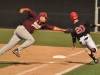 Palomar Infielder Mitch Gallagher (20) avoids the tag to reach first base safely during the April 21 game against Southwestern College at Palomar College Ballpark. Palomar won the game 12-7. Aaron Fortin/The Telescope