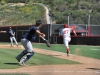 Palomar catcher John Mackay (27) lays down a bunt and ends up beating the throw to first to get on base March 25 at Palomar College Ballpark against San Diego Mesa. The Comets would go on to win 9-3. Aaron Fortin/ The Telescope