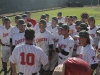 Palomar Coach Buck Taylor (10) gathers up the team for a post-game talk. The Comets beat visiting Riverside Community College May 1 at Myers Field 7-3. Philip Farry / The Telescope