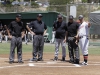 Palomar’s baseball coach Buck Taylor (far right) goes over the Myers Field ground rules with Riverside Community College coach Dennis Rogers (middle) and the game umpires prior to the start of the 2015 California Community College Athletic Association (CCCAA) best two-out-of-three playoff game against visiting Tigers. The Comets won the game 7-3 May 1. Philip Farry / The Telescope