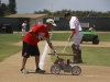 Grounds crew and coaches make final touches to the field prior to start of game two of the Southern California Sectional against Saddleback College on May 17 at Myers Field. Stephen Davis/The Telescope