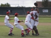 Palomar's players celebrate after the final out is recorded in the bottom of the eleventh inning against visiting Saddleback College at Myers Field May 17. The Comets won 4-3 in 11 innings to sweep visiting Gauchos and advance to the final four to be held in Fresno next weekend. Philip Farry / The Telescope