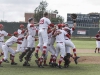 Palomar's players celebrate after the final out is recorded in the bottom of the eleventh inning against visiting Saddleback College at Myers Field 17 May. The Comets won 4-3 in 11 innings to sweep visiting Gauchos and advance to the final four to be held in Fresno next weekend. Philip Farry / The Telescope