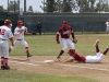 Palomar’s Chris Stratton races to first base trying to beat Saddlebacks first baseman Ryan Fitzpatrick during the first inning. The Comets won 4-3 in 11 innings to sweep visiting Saddleback COllege and advance to the final four to be held in Fresno next weekend. Philip Farry / The Telescope