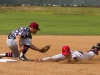 Palomar's Dylan Brault slides safely into third base under the tag of San Diego City's Alberto Robles. The Comets beat the visiting Knights Saturday 21 Feb 8-1. Philip Farry / The Telescope