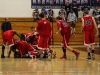 The Palomar College Men's Basketball Team celebrates their 67-62 win over Mira Costa College Friday night by dog-piling Jeremy Franklin #23, who helped secure the win for Palomar by snagging a rebound and sinking both of his free throws after getting fouled with less than a minute to go in overtime, Feb 20. Photo by Dirk Callum