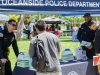 Two officers from the Oceanside Police Department hand out information packets on careers in law enforcement to any Palomar students who stoped by amd inquired. Tracy Grassel/The Telescope