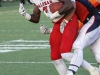 Palomar Running Back Deviante Sayles drags a Citrus College player into the endzone for a three yard touchdown during second quarter. Palomar opened their season Sept. 5 on the road in Glendora Calif. against Citrus College . The Comets beat the Owls 24-14. Philip Farry / The Telescope