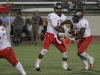 Palomar quarterback Risaiah Busurto (12) hands the ball off to Daviente Sayles (6) during the fourth quarter. Palomar opened their season Sept. 5 on the road in Glendora Calif. against the Owls. The Comets beat the Owls 24-14. Philip Farry / The Telescope