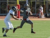 Palomar’s Austin Early (9) stiff arms a Fullerton College defender and gained 13yards on the play. The Hornets defeated the Comets 42-14 at Wilson Stadium in Escondido on Nov 7. The Comets dropped their record to (3-6,1-4). Philip Farry / The Telescope