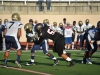 Palomar’s defensive line Rafael Sangines (50) tackles the Mesa player with the ball at the game Sept. 19, 2015 at Wilson Stadium, Escondido High School. Kari Clarke/The Telescope