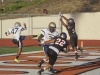 Palomar’s Ricky Smith (33) attempts to block a punt from San Diego Mesa College’s Chris Quinn (47) during the first quarter. The Comets hosted the Olympians at Wilson Stadium's Chick Embrey Field in Escondido, Calif. Sept 19. The Comets won the non-conference game 42-21. Philip Farry / The Telescope