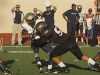 Palomar defensive lineman Rafael Sangines (50) tackles a San Diego Mesa College running back for a loss during the first quarter. The Comets hosted the Olympians at Wilson Stadium's Chick Embrey Field in Escondido, Ca. Sept 19. The Comets won the non-conference game 42-21. Philip Farry / The Telescope