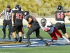 Palomar’s Devyn Comer sacks Santa Ana College quarterback Thomas Becerra for an eight yard loss. Comer finished the game with three sacks. The Comets defeated the Dons 37-27 at Santa Ana Stadium in Santa Ana on Nov 14. The win improved the Comets record to 4-6 (2-4 in the Southern Conference). Philip Farry / The Telescope