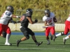 Palomar’s LaMont Chaney (7) eyes the hole and takes the ball for a gain of 13 yards. Chaney finished the game with 4 rushes and 31 yards. The Comets defeated the Dons 37-27 at Santa Ana Stadium in Santa Ana on Nov 14. The win improved the Comets record to 4-6 (2-4 in the Southern Conference). Philip Farry / The Telescope