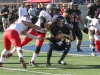 Palomar’s Roger Mann (56) and Rafael Sangines (50) sack Santa Ana College quarterback Thomas Becerra for an eight yard loss during the third quarter. The Comets defeated the Dons 37-27 at Santa Ana Stadium in Santa Ana on Nov 14. The win improved the Comets record to 4-6 (2-4 in the Southern Conference). Philip Farry / The Telescope