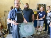 Michael Hernandez demonstratewhat's needed to polishing a paper weight for his Glass-Blowing 1 students in the Palomar campus studio on Tuesday Sept. 15. Different weight grits are used in polishing the bottom of hand blown work in order to smooth out sharp surfaces. Brandy Sebastian/The Telescope