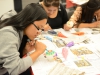 Thi Huynh decorates a sugar skull during a Dia Del Los Muertos event in the TLC on Thursday, Oct. 29, 2015.Â© Yvette Monteleone/The Telescope 2015