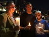 (Left to Right) Pastor Greg Bostrom of the Christ Presbyterian Church of Carlsbad, Rabbi Josh Burrows of the Jewish Collaborative of San Diego and Issam Ligrachi, a member of the North County Islamic Federation, stand together during an interfaith candlelight vigil that honored the memory of the victims of San Bernardino massacre. The event was hosted by the Christ Presbyterian Church of Carlsbad, the Jewish Collaborative of San Diego and the the North County Islamic Foundation. Dec. 8, 2015 in Carlsbad. Photo by Lou Roubitchek / The Telescope