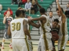 Palomar guard Deven Riley (#20) cuts through the Griffins' defense and scores two points during Feb. 18 away game at Grossmont College. Comets defeated Griffins with a final score of 69-57. Dirk Callum / The Telescope