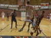 Palomar forward Spencer Benson (33) leaps and throws the ball back into play as L.A. Southwest players avoid being hit by the ball during the first quarter. The Comets beat the Cougars 75-71 Friday 27 Nov at The Dome. Palomar hosted its 11th annual Thanksgiving Tournament. Philip Farry / The Telescope