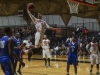 Players from both Palomar and San Bernardino Valley College watch Palomar’s Jordan Holmes (5) flies throw the air to dunk with 10 seconds left in the Championship game. The Comets were defeated 88-77 in the champion ship game by the Wolverines and finished in second place of the 11th Annual Thanksgiving Tournament held at the Dome on Nov. 29. Philip Farry / The Telescope