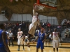 Players from both Palomar and San Bernardino Valley College watch Palomar’s Jordan Holmes (5) flies throw the air to dunk with 10 seconds left in the Championship game. The Comets were defeated 88-77 in the champion ship game by the Wolverines and finished in second place of the 11th Annual Thanksgiving Tournament held atthe Dome on Nov. 29. Philip Farry / The Telescope