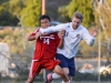 Palomar's forward Juan Garcia #14, San Diego Mesa College’s, Bryce Towne, Forward #21, push their way to gain control of the ball for a home game at Minkoff Field, Nov. 10, 2015. Final score 1-2 for a Palomar loss in the Pacific Coast Athletic Conference. Brandy Sebastian/The Telescope