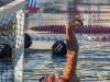 Palomar goalie Hanus Lewit warms up prior to the start of the fourth quarter. The Comets were winning by ten against visiting Grossmont when Lewit replaced starting goalie Adam Kelsey. The Comtes beat the Griffins 19-8 Oct 21 in their final home game held at the Wallace Memorial pool. The win improved the Comets record to 7-1 in the PCAC and clinched a tie for the conference title. Philip Farry / The Telescope