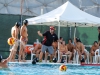 Palomar Coach Chad Aronen talks to the team during Oct. 21 match against visiting Grossmont College at the Wallace Memorial Pool. Palomar went on to win 19-8. Hanadi Cackler/ The Telescope