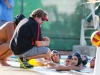 Palomar Coach Chad Aronen with his team during the Oct. 21 match against visiting Grossmont College at the Wallace Memorial Pool. Palomar went on to win 19-8. Hanadi Cackler/ The Telescope