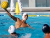 Palomar's Conner Chanove (4) gets ready to pass the ball at the 2015 Men's Water Polo Pacific Coast Athletic Conference on Nov. 7 at the Ned Baumer pool. Travis Lane (21) and Devin O'Donnell (9) look on. The Pacific Coast Athletic Conference (PCAC) is an intercollegiate athletic conference governed by the California Community College Athletic Association (CCCAA). Mesa defeated Palomar 10 - 6. The Comets took second place overall. Coleen Burnham/The Telescope