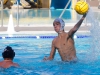 Palomar's Cameron Rath (14) attempts to shoot a goal during the 2015 Men's Water Polo Pacific Coast Athletic Conference on Nov. 7 at the Ned Baumer pool. Mesa's Marco Roy (7) looks on. The Pacific Coast Athletic Conference (PCAC) is an intercollegiate athletic conference governed by the California Community College Athletic Association (CCCAA). Palomar played Mesa in the Championship final but lost 10 - 6. The Comets took second place overall. Coleen Burnham/The Telescope